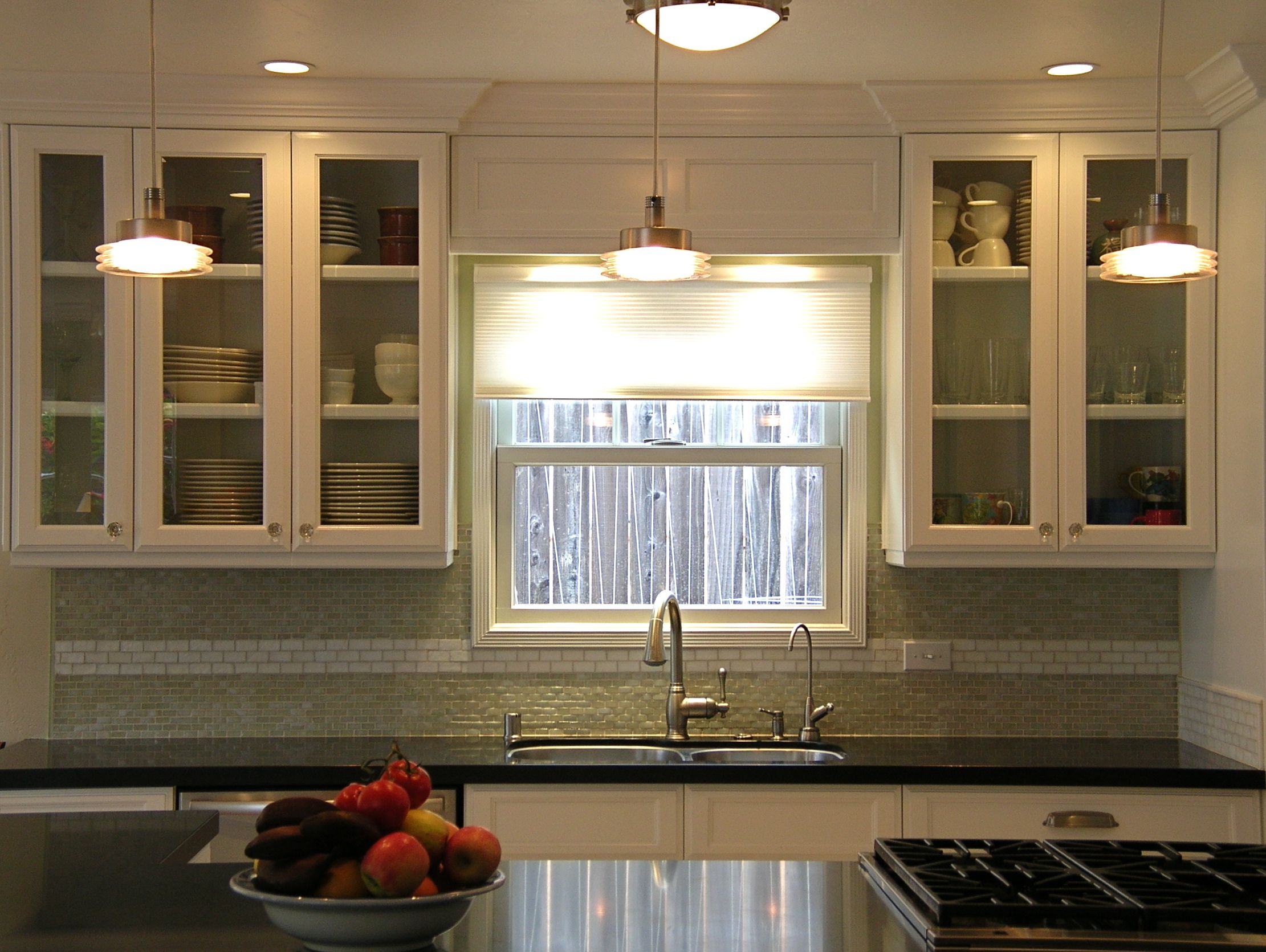 classic_cottage_kitchen_remodel_with_glass_front_cabinets_soapstone_like_countertops_and_glass_tile_backsplash_3