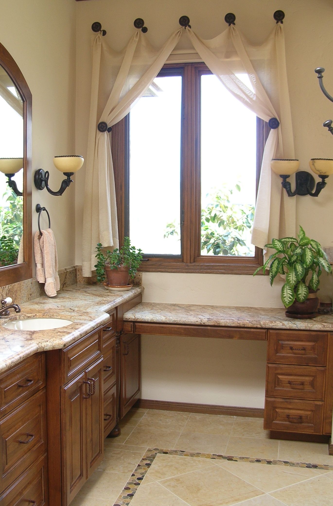 spanish_colonial_master_bathroom_design_with_custom_cabinets_countertops_and_mirrors_3